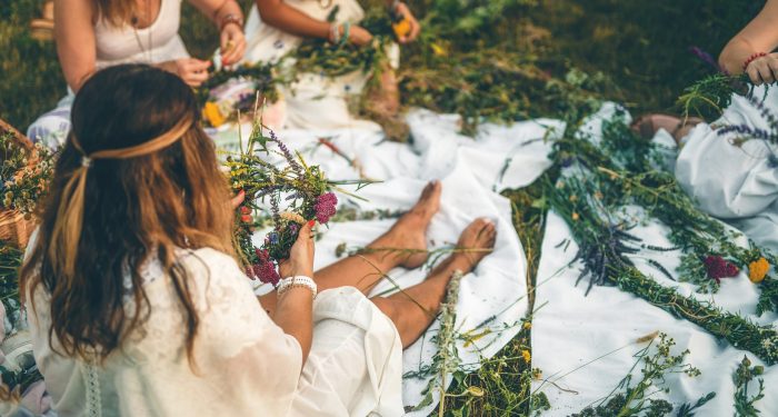 View,Of,Women,Making,Wreaths,With,Beautiful,Flowers.